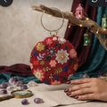 Heritage Red & Gold Hand-Embroidered Circular Party Clutch